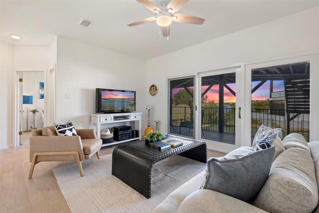 2449 Crosswind Dr, Lakeway, TX 78669 - living room featuring wood finished floors and ceiling fan