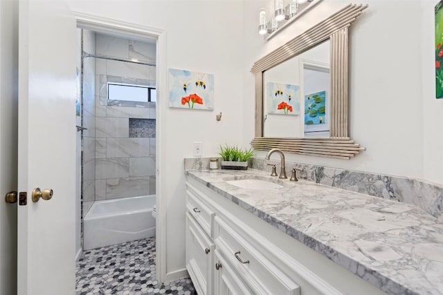 2449 Crosswind Dr, Lakeway, TX 78669 - bathroom with vanity, toilet, shower / washtub combination, and baseboards