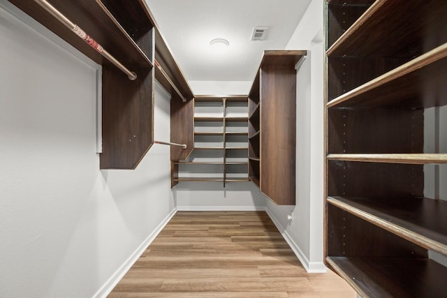 4116 Creek Ledge Unit 108, Austin, TX 78731 - walk in closet with wood finished floors
