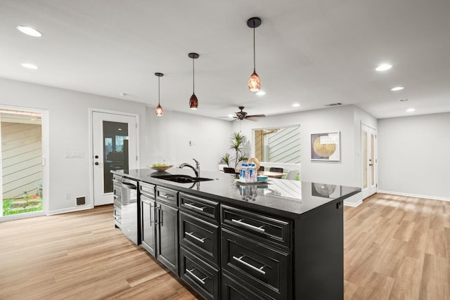 4116 Creek Ledge Unit 108, Austin, TX 78731 - kitchen featuring dark cabinetry, dishwasher, light wood finished floors, ceiling fan, and recessed lighting
