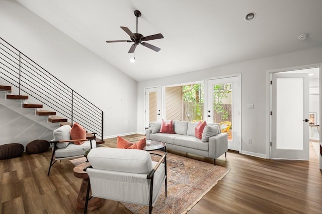 4116 Creek Ledge Unit 108, Austin, TX 78731 - living area with vaulted ceiling, stairs, baseboards, wood finished floors, and recessed lighting