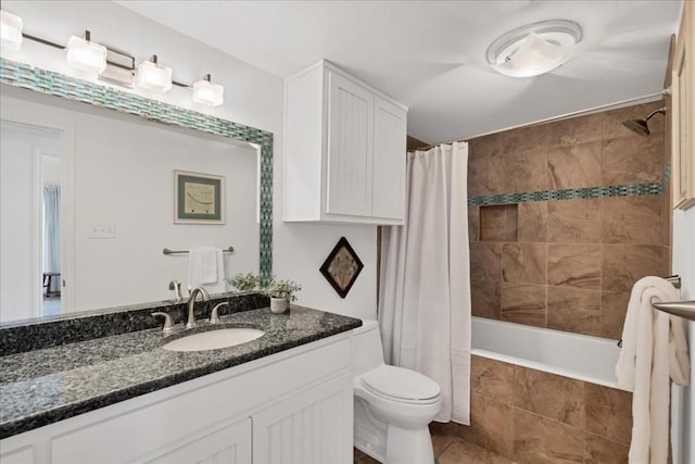 922 Challenger, Lakeway, TX 78734 - bathroom with vanity, tiled shower / bath, toilet, and tile patterned flooring