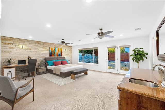 922 Challenger, Lakeway, TX 78734 - bedroom featuring a sink, access to exterior, light colored carpet, an office area, and recessed lighting