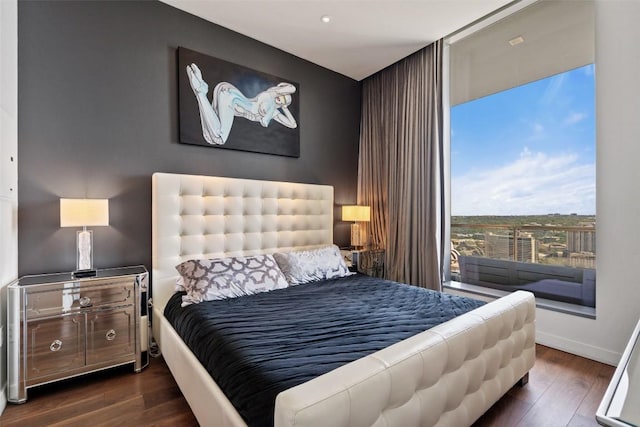 210 Lavaca St Unit 2203, Austin, TX 78701 - bedroom featuring wood finished floors