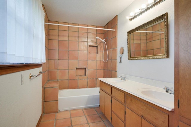 9438 Circle Dr, Austin, TX 78736 - bathroom featuring washtub / shower combination, double vanity, and tile patterned floors