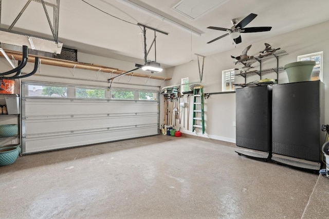 313 Grand Oaks Ln, Georgetown, TX 78628 - garage featuring a garage door opener and a ceiling fan