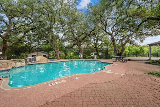 12166 Metric Blvd Unit 115, Austin, TX 78758 - community pool with a patio