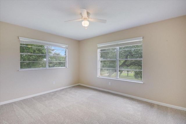 9504 Flintrock Cir, Austin, TX 78737 - empty room with carpet flooring, baseboards, and a ceiling fan