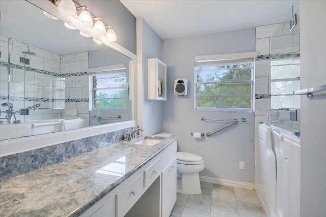 9504 Flintrock Cir, Austin, TX 78737 - bathroom with toilet, a tub to relax in, vanity, tiled shower, and healthy amount of natural light