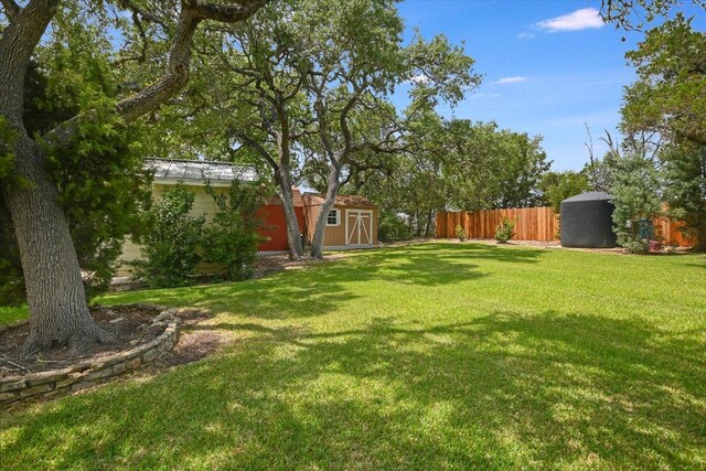 9504 Flintrock Cir, Austin, TX 78737 - view of yard with a storage shed