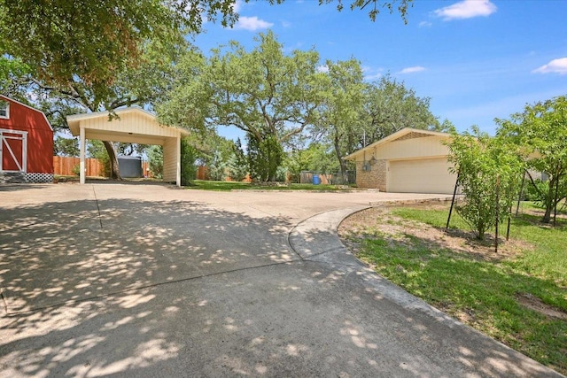 9504 Flintrock Cir, Austin, TX 78737 - view of side of home featuring driveway