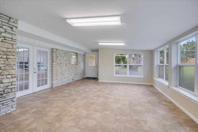 9504 Flintrock Cir, Austin, TX 78737 - unfurnished sunroom featuring french doors