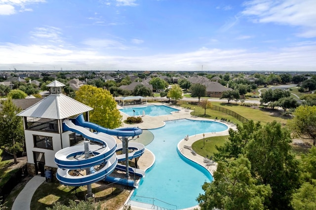 13712 Fallsprings Way, Manor, TX 78653 - aerial view of a pool and a tree filled landscape