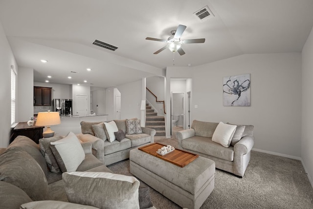 13712 Fallsprings Way, Manor, TX 78653 - living area featuring lofted ceiling, stairway, a ceiling fan, baseboards, and recessed lighting