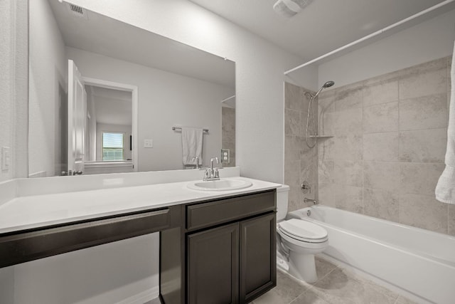 13712 Fallsprings Way, Manor, TX 78653 - bathroom with vanity, bathtub / shower combination, toilet, and tile patterned flooring