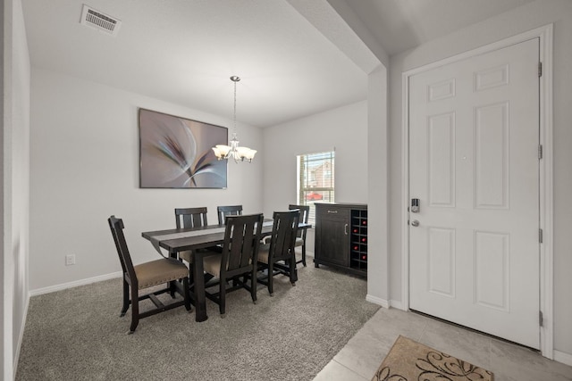 13712 Fallsprings Way, Manor, TX 78653 - dining space with a chandelier, baseboards, and light colored carpet