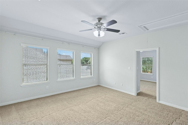 2804 Prosperity, Leander, TX 78641 - unfurnished room with attic access, light carpet, a ceiling fan, and healthy amount of natural light