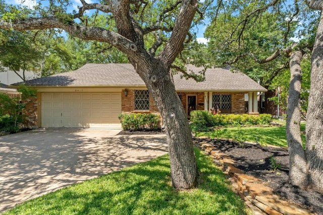 8417 Cornerwood Dr, Austin, TX 78717 - ranch-style house featuring driveway, a garage, brick siding, and a front lawn