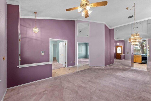 8417 Cornerwood Dr, Austin, TX 78717 - unfurnished living room featuring carpet flooring, a high ceiling, crown molding, ceiling fan, and a chandelier