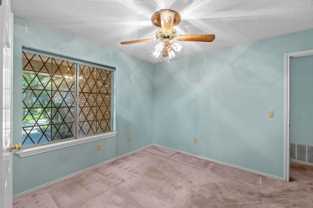 8417 Cornerwood Dr, Austin, TX 78717 - carpeted spare room with ceiling fan and a textured ceiling