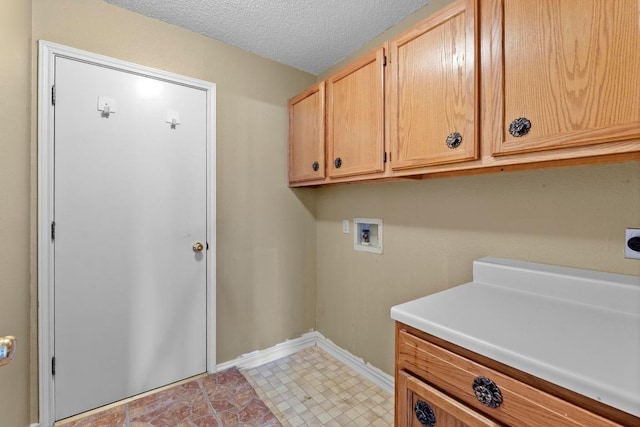 8417 Cornerwood Dr, Austin, TX 78717 - laundry room with cabinet space, hookup for a washing machine, hookup for an electric dryer, and a textured ceiling