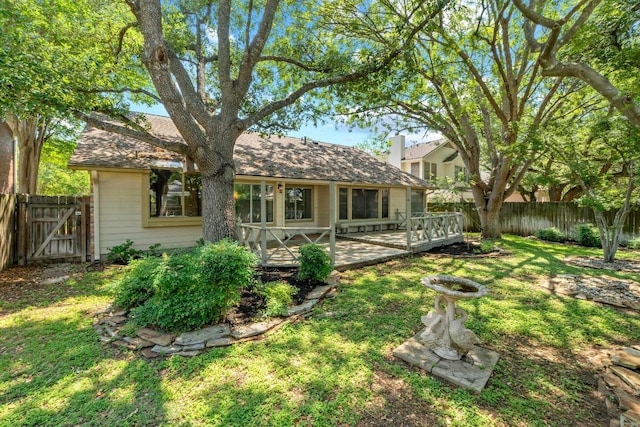 8417 Cornerwood Dr, Austin, TX 78717 - back of house featuring a fenced backyard, a wooden deck, a gate, a shingled roof, and a chimney