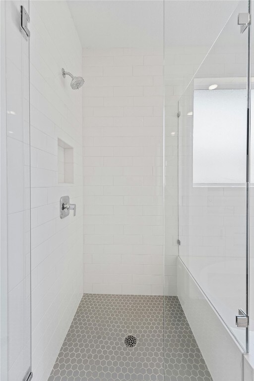 632 Deerpath St, Leander, TX 78641 - bathroom featuring a stall shower and a garden tub