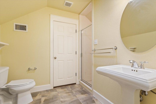 2105 Red Rock Dr, Belton, TX 76513 - bathroom with toilet, a sink, baseboards, a shower stall, and vaulted ceiling