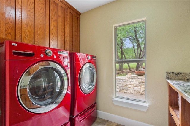 2105 Red Rock Dr, Belton, TX 76513 - laundry room featuring washer and dryer, baseboards, and cabinet space