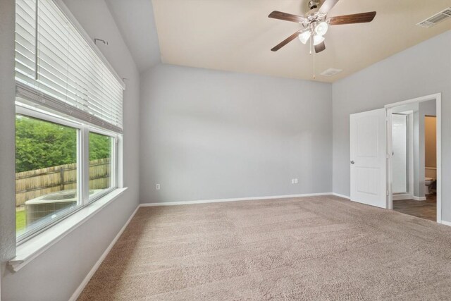 1008 Comal Run, Hutto, TX 78634 - carpeted empty room with ceiling fan, baseboards, and lofted ceiling