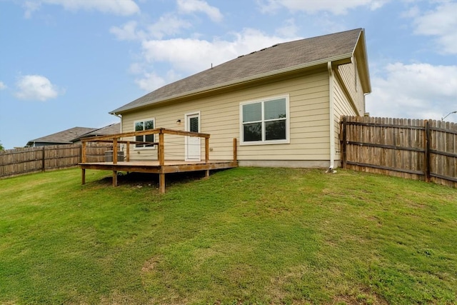 1008 Comal Run, Hutto, TX 78634 - back of property with a wooden deck