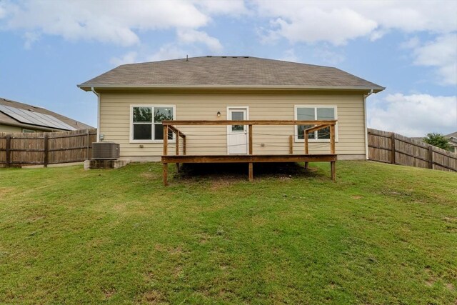1008 Comal Run, Hutto, TX 78634 - back of house with a wooden deck and cooling unit