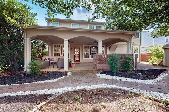 952 Hometown Pkwy, Kyle, TX 78640 - view of front of property featuring ceiling fan, an outdoor living space, and a patio area