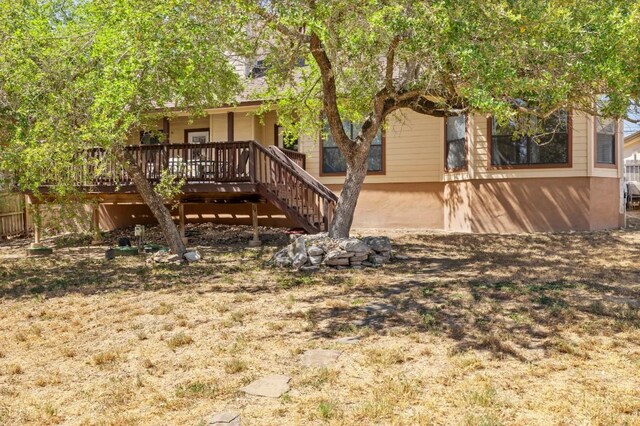 15100 General Williamson Dr, Austin, TX 78734 - rear view of house featuring stairs and a wooden deck