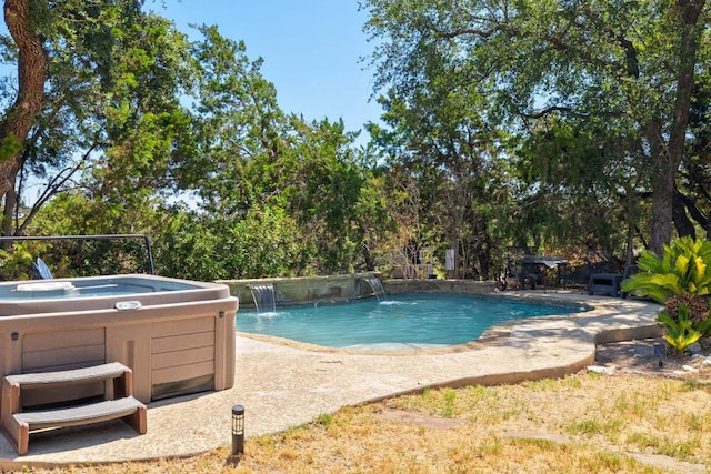 15100 General Williamson Dr, Austin, TX 78734 - swimming pool featuring a hot tub, a patio area, and view of scattered trees