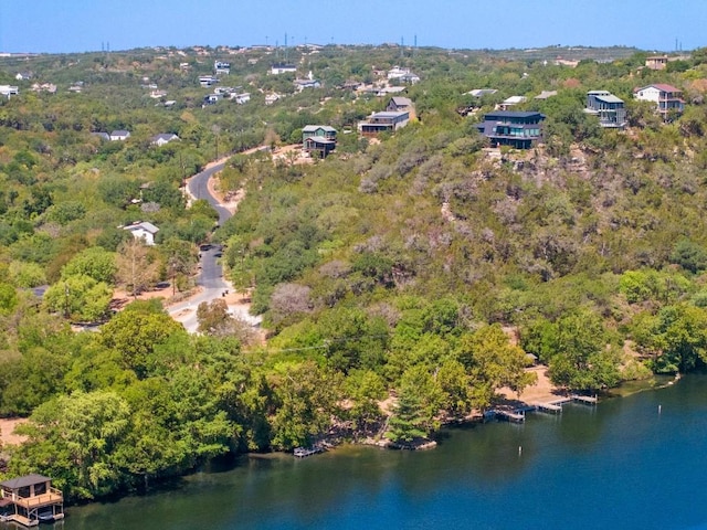 15100 General Williamson Dr, Austin, TX 78734 - aerial view of property and surrounding area with a large body of water and a heavily wooded area