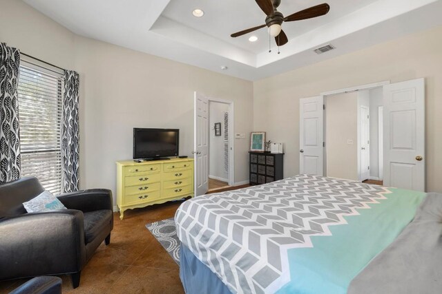 15100 General Williamson Dr, Austin, TX 78734 - bedroom with recessed lighting, a raised ceiling, a ceiling fan, and baseboards