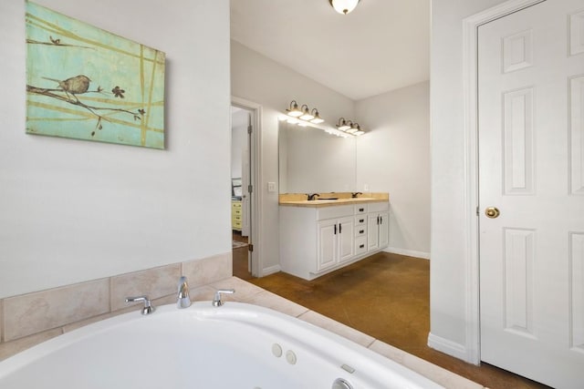 15100 General Williamson Dr, Austin, TX 78734 - bathroom with a jetted tub, vanity, and baseboards