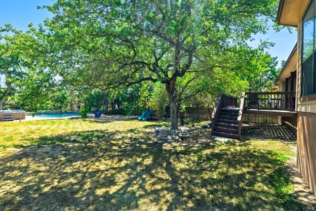 15100 General Williamson Dr, Austin, TX 78734 - fenced backyard featuring stairway, a deck, and a pool