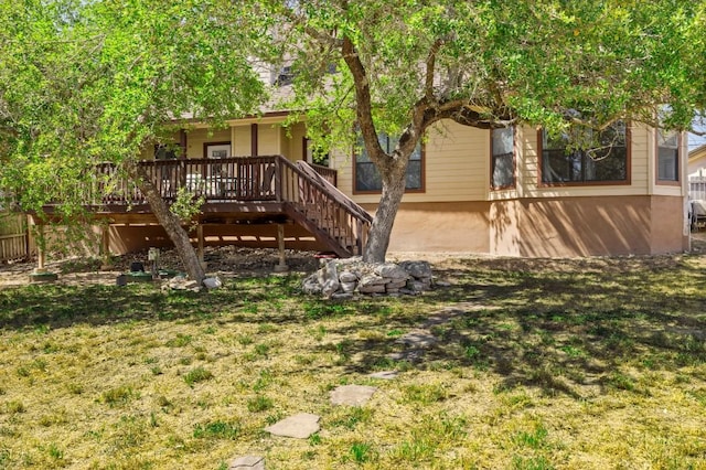 15100 General Williamson Dr, Austin, TX 78734 - rear view of property with stairs, a deck, and a yard