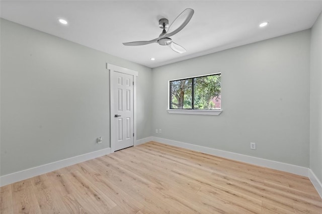 7065 Wheatfield Way, Kyle, TX 78640 - spare room with a ceiling fan, wood finished floors, and recessed lighting