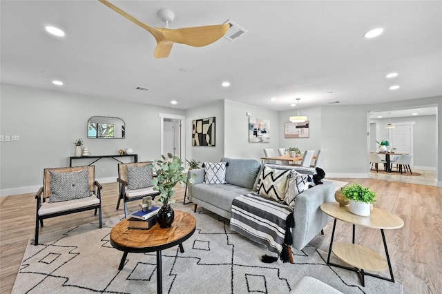 7065 Wheatfield Way, Kyle, TX 78640 - living room with recessed lighting, light wood-type flooring, and ceiling fan