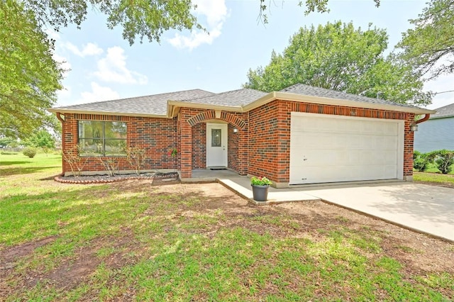 7065 Wheatfield Way, Kyle, TX 78640 - ranch-style home featuring an attached garage, a shingled roof, concrete driveway, a front lawn, and brick siding