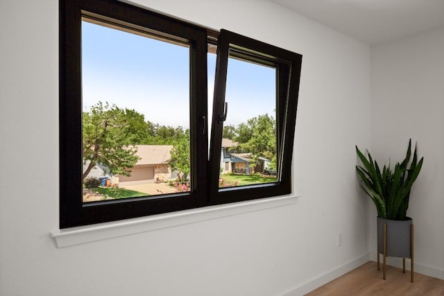 3809 Eton Ln, Austin, TX 78727 - living area with wood finished floors and baseboards