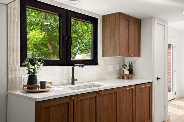 3809 Eton Ln, Austin, TX 78727 - bar area featuring a sink and decorative backsplash