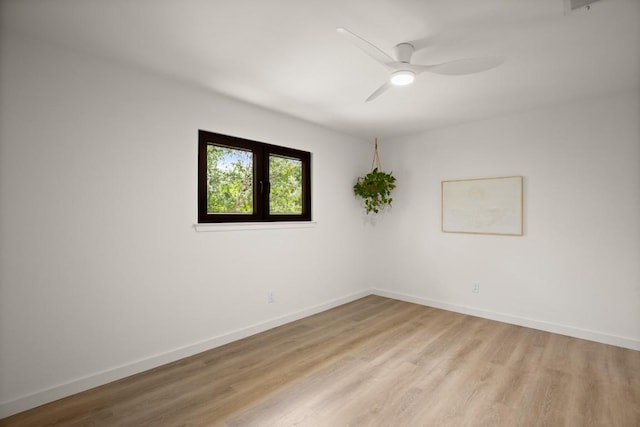 3809 Eton Ln, Austin, TX 78727 - empty room featuring light wood finished floors, a ceiling fan, and baseboards