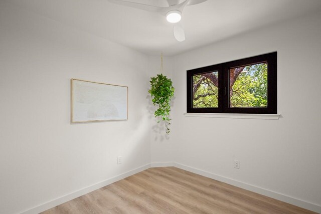 3809 Eton Ln, Austin, TX 78727 - unfurnished room with a ceiling fan, baseboards, and light wood finished floors