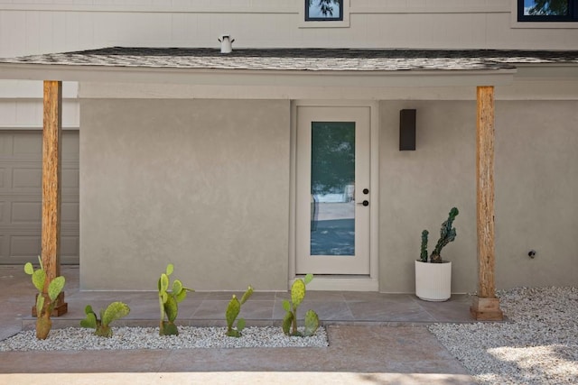 3809 Eton Ln, Austin, TX 78727 - view of exterior entry with a shingled roof