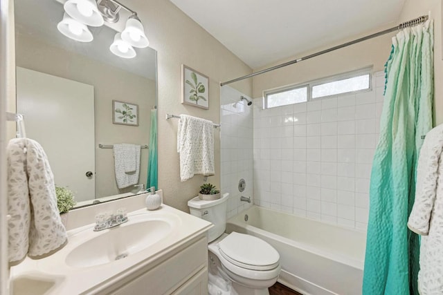 1101 Winecup Ct, Leander, TX 78641 - full bathroom featuring shower / bathtub combination with curtain, vanity, and toilet