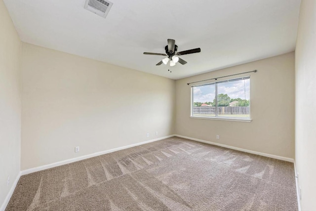 1101 Winecup Ct, Leander, TX 78641 - unfurnished room featuring carpet flooring, baseboards, and a ceiling fan